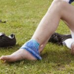 soccer player icing ankle 59d4d428054ad90010127473